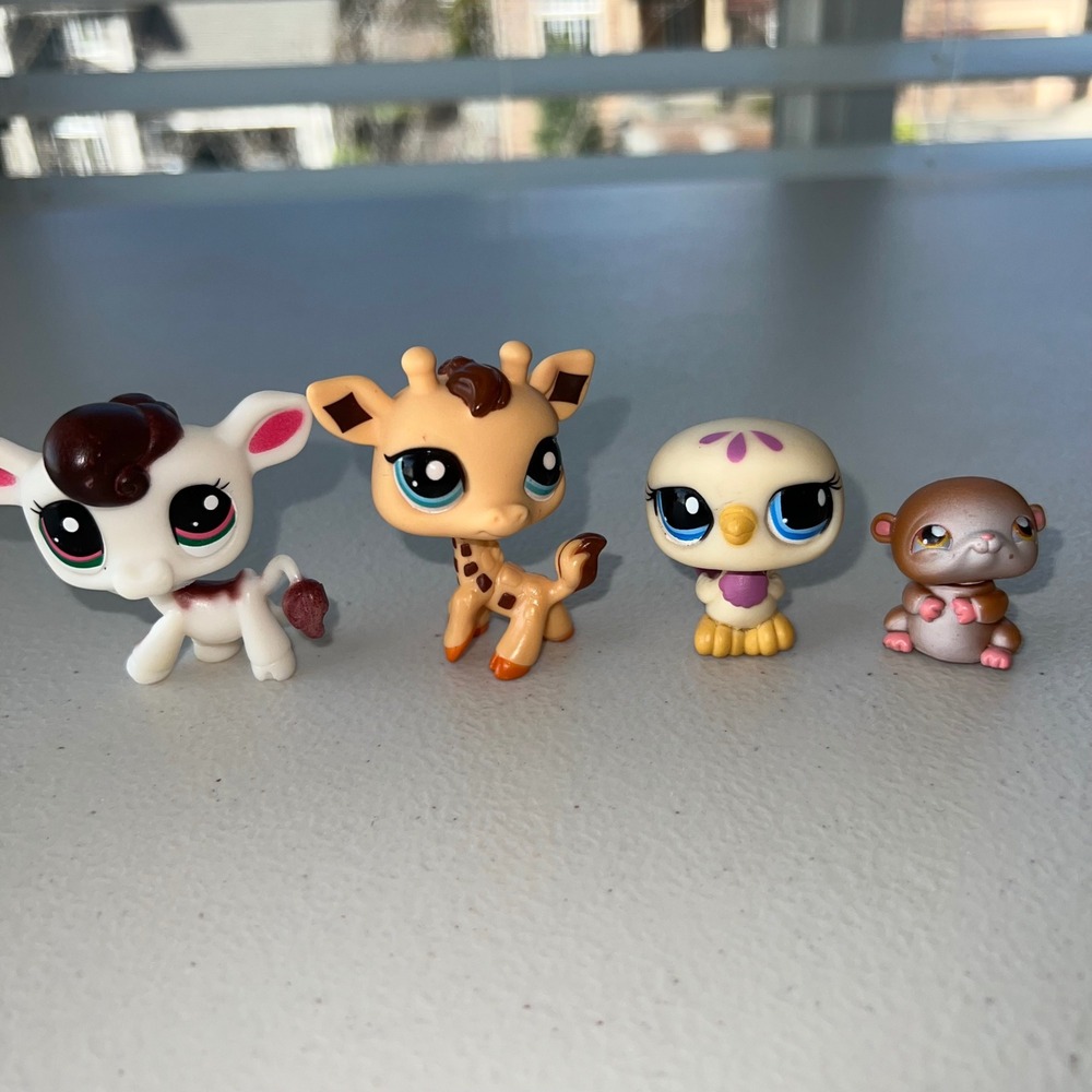 Littlest Pet Shop LPS Lot of 4 including cow, hamster, giraffe, yellow pigeon